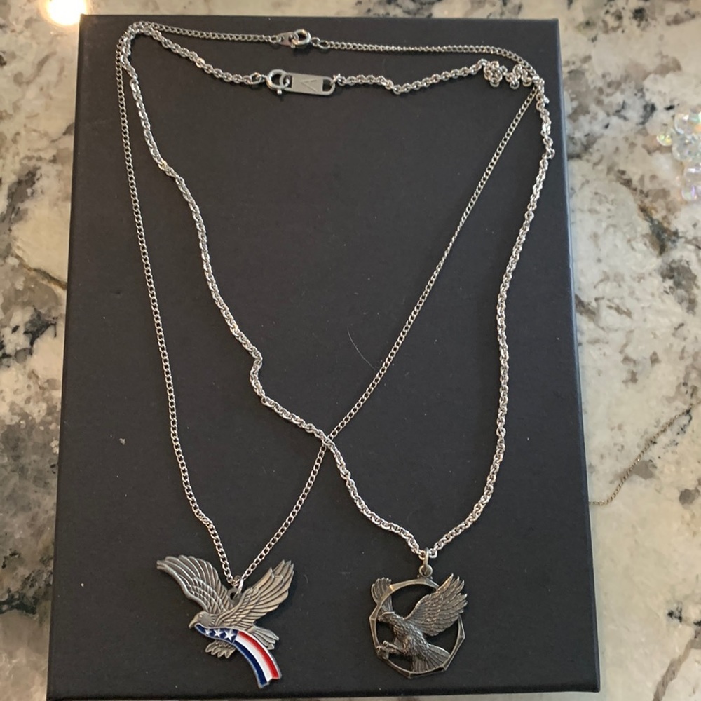 Two necklaces w/ American Eagle pendants One marked “Artisan”